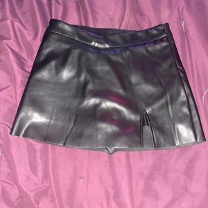 Black leather mini skirt